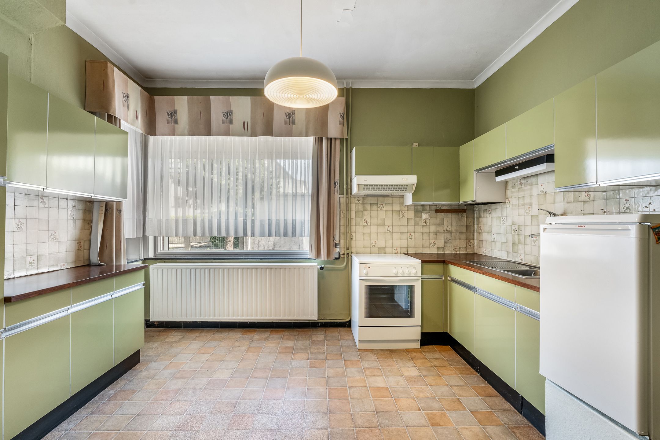 Halfopen gezinswoning met garage te Vlijtingen foto 7
