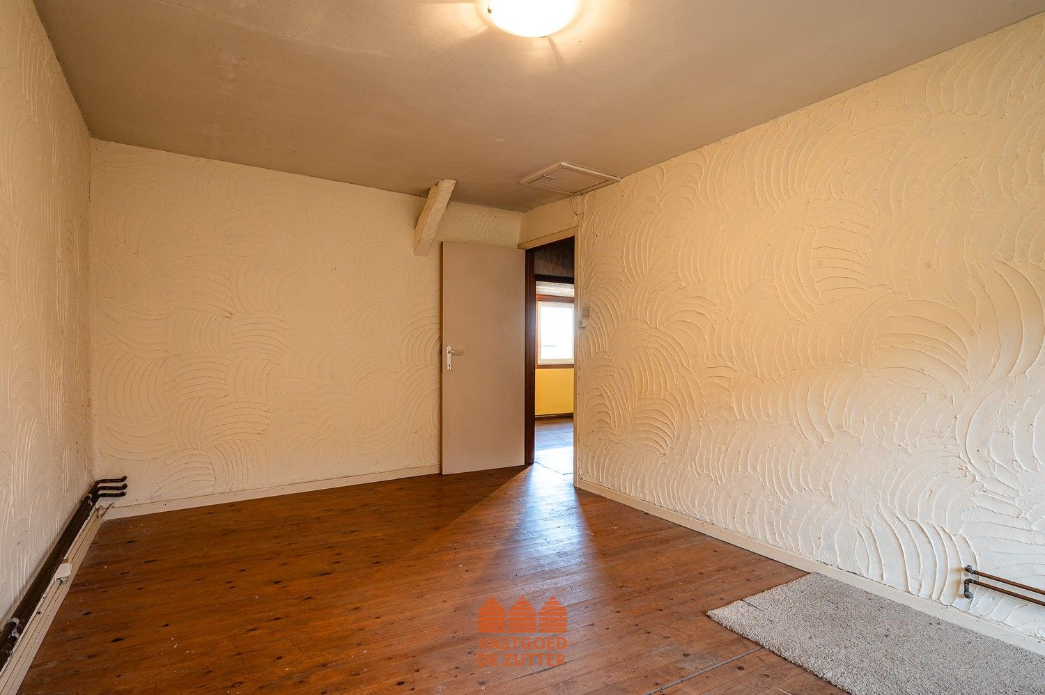 Ruime woning met handelspand in het centrum van Boekhoute foto 11