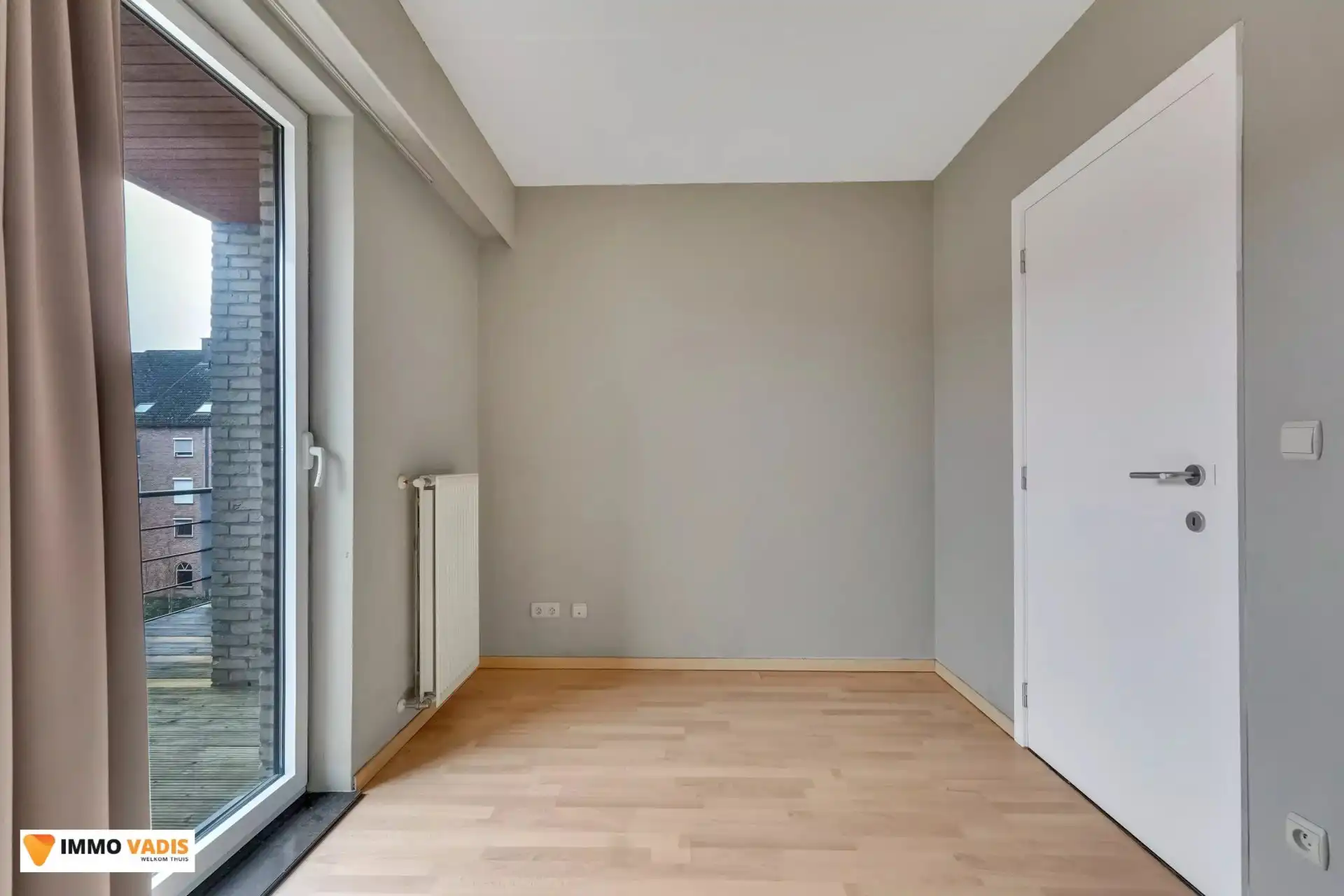 Goed onderhouden appartement met twee slaapkamers, terras en afgesloten parkeerplaats foto 7