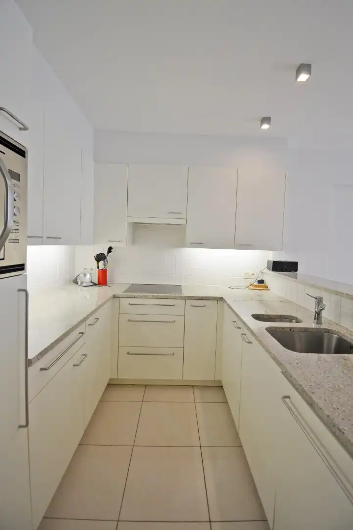 Ruim en lichtrijk appartement met 2 slaapkamers vlakbij het Rubensplein. foto 9