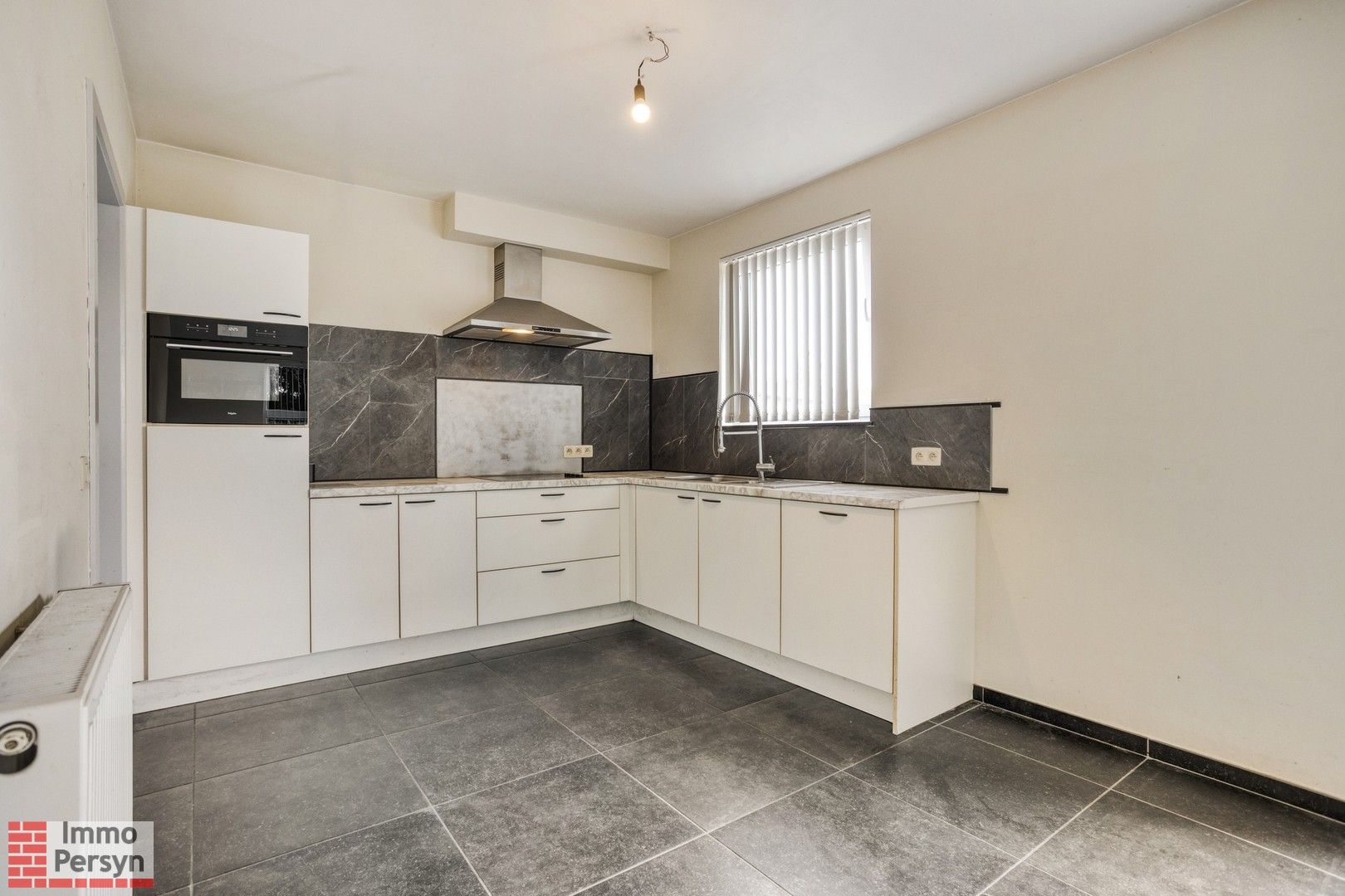 Ruime gezinswoning met garage, tuin en 3 slaapkamers in Houwaart foto 5