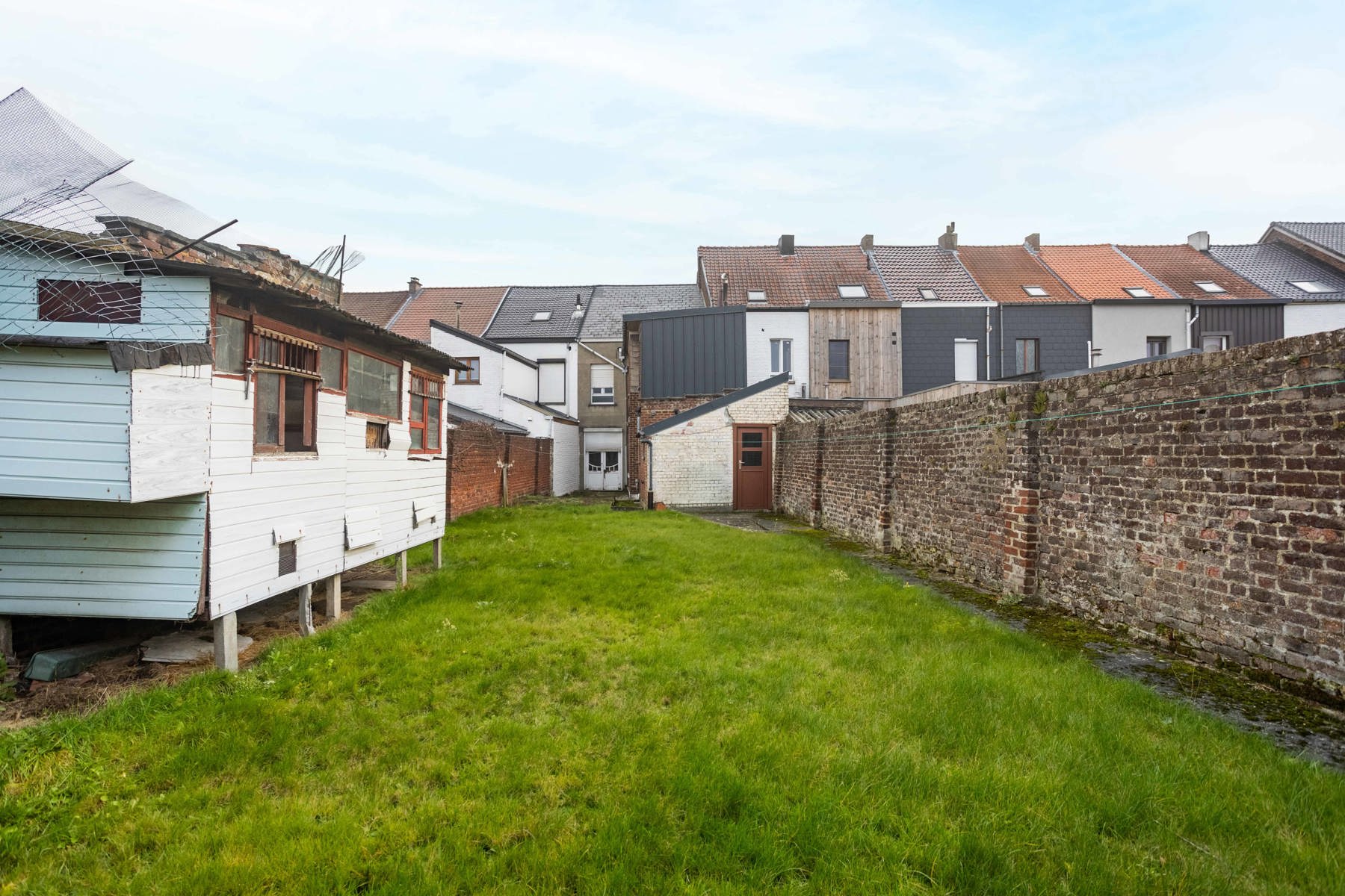 TE RENOVEREN RIJWONING MET TUIN EN GARAGEBOXEN foto 22