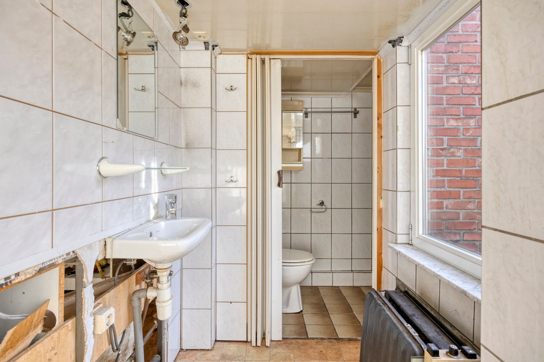 Te renoveren starterswoning  in Mechelen foto 11