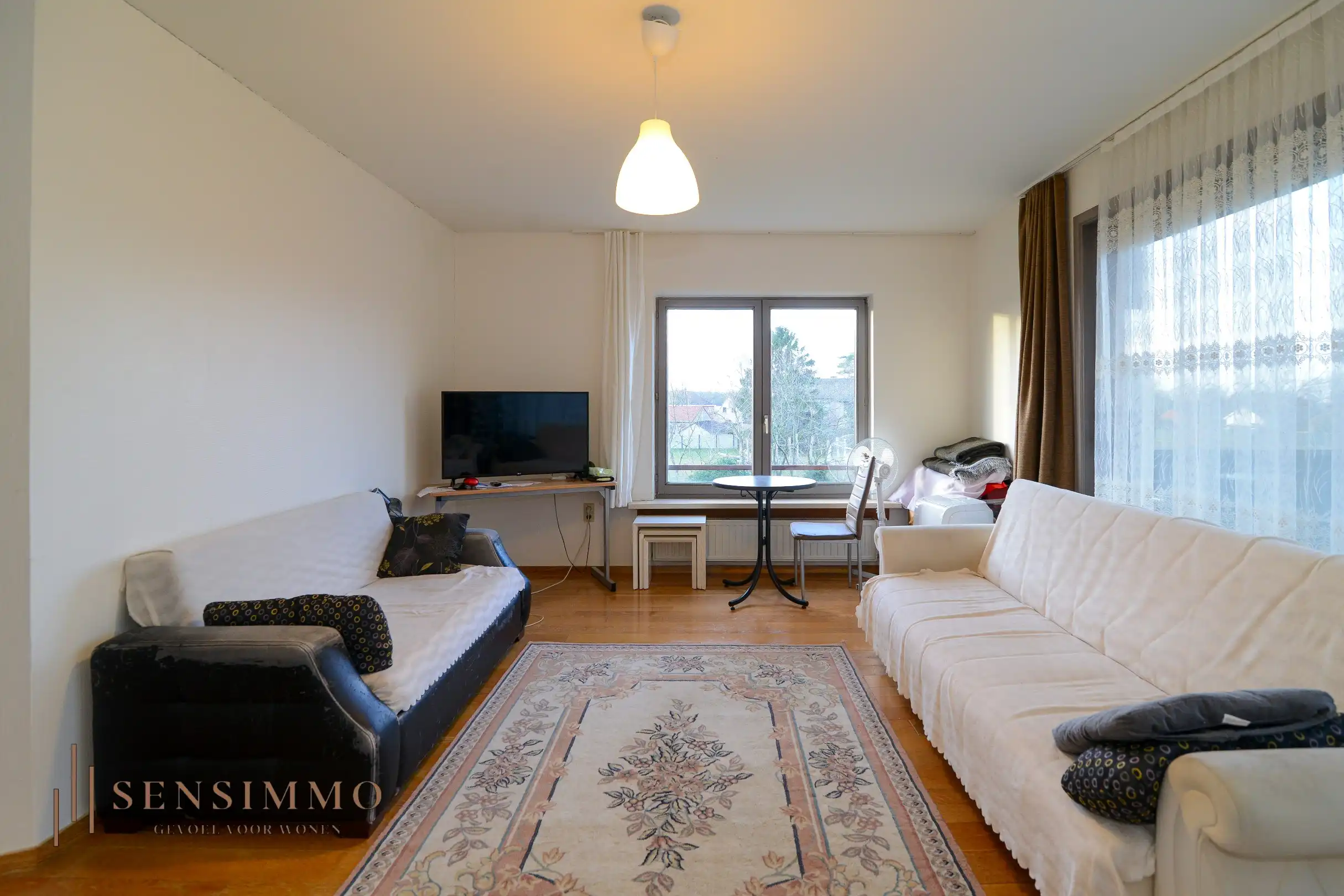 Eenslaapkamer appartement + terras, parking en kelderberging foto 4