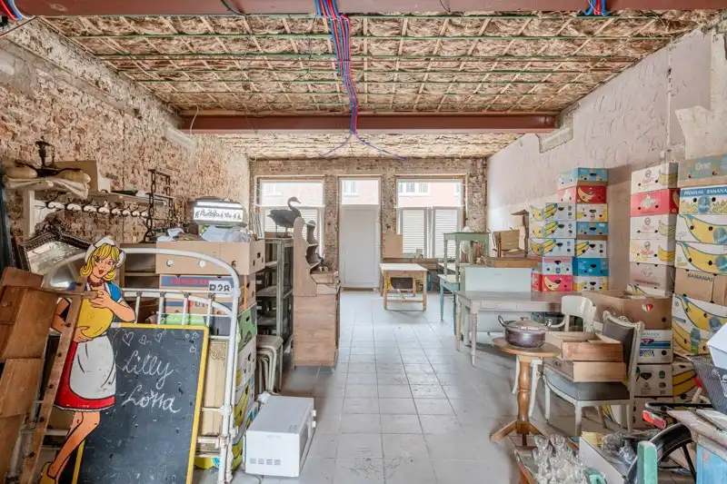 Handelsruimte met woonappartement in het centrum van Wommersom foto 29