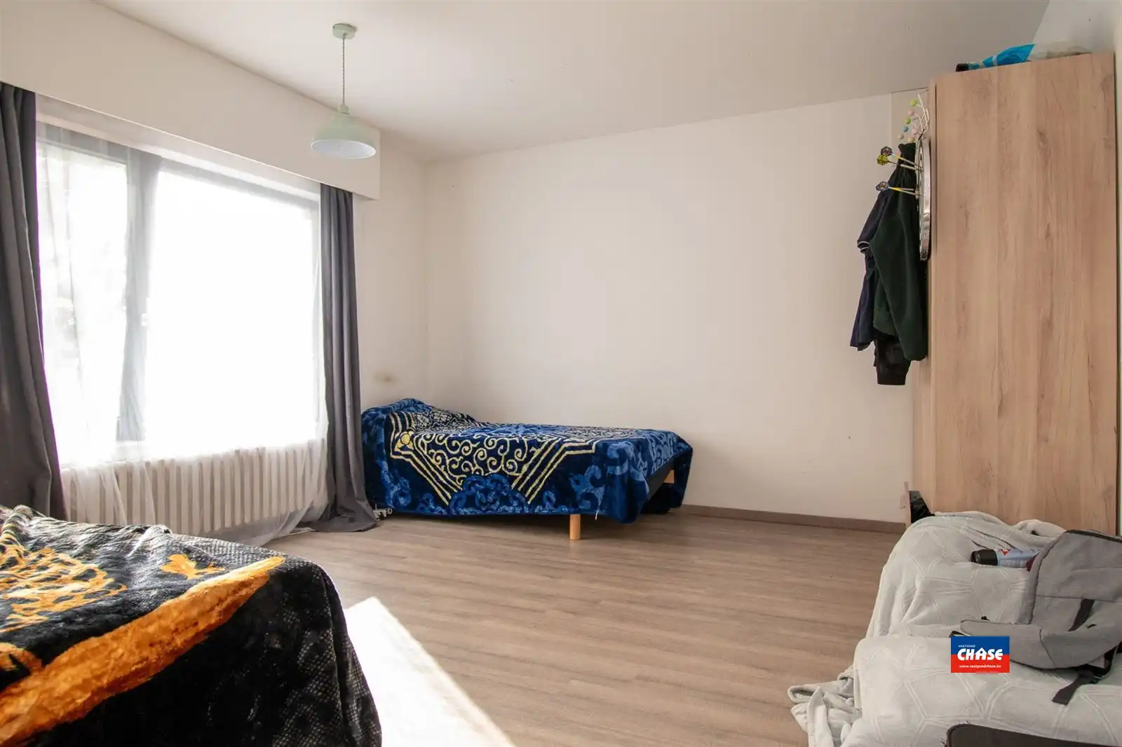 Handelspand met appartement en garagebox foto 15