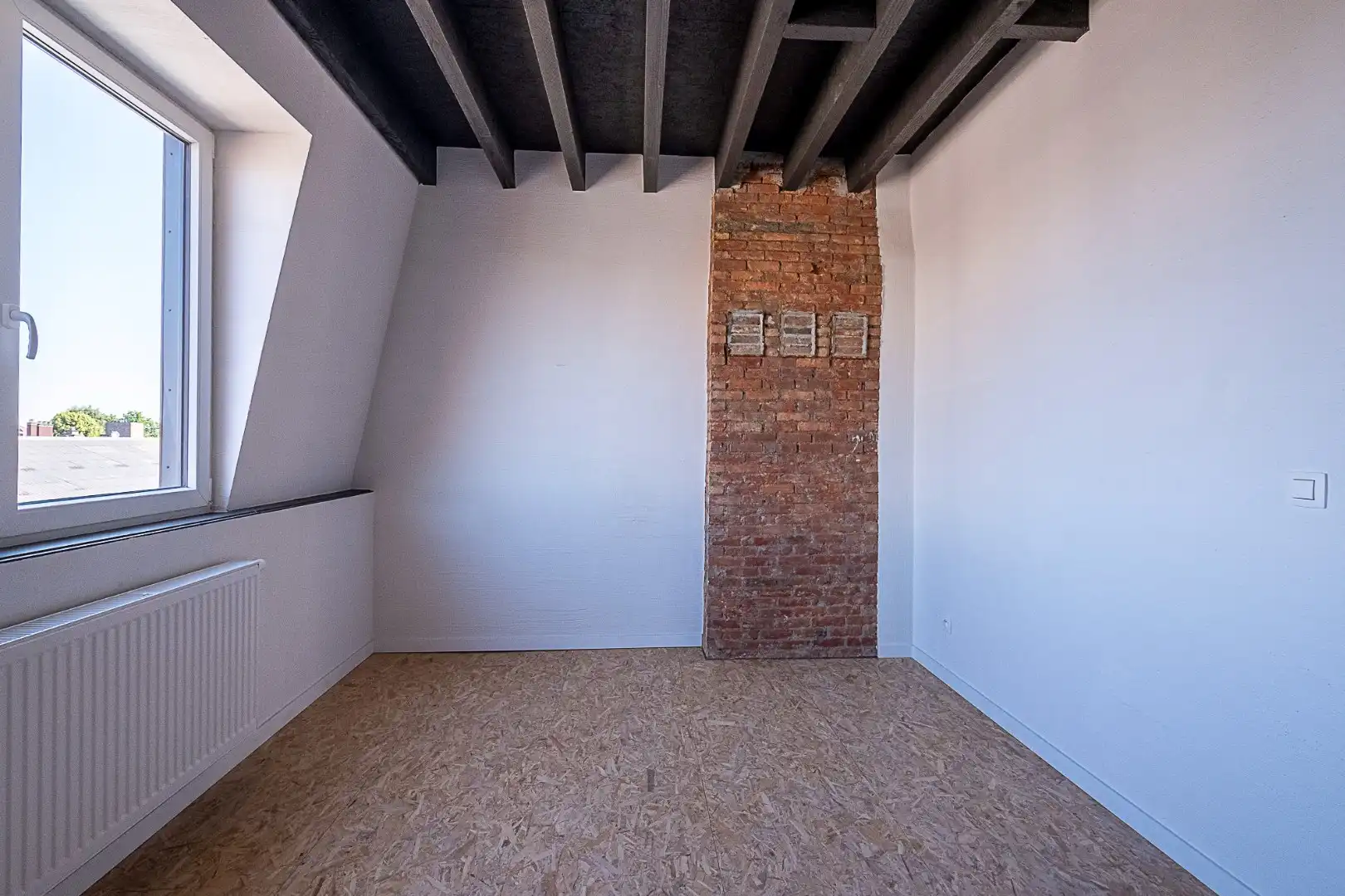 Genieten op hoogte: lichtrijk dakappartement met terras foto 15