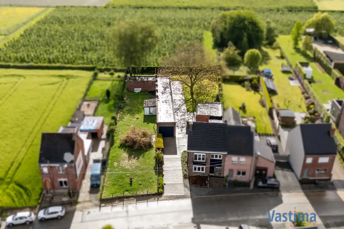 Woning met opslagruimte en grond op strategische ligging foto 32