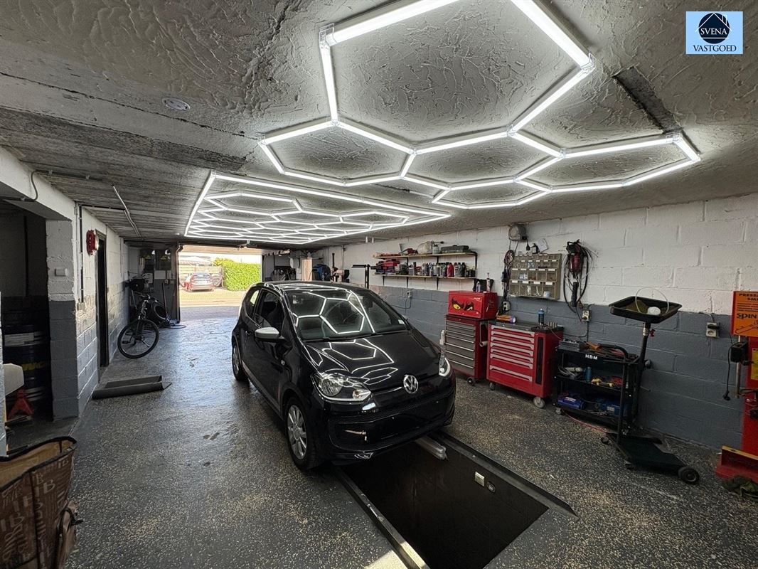 WONING MET HANDELSRUIMTE EN 3 SLAAPKAMERS foto 17