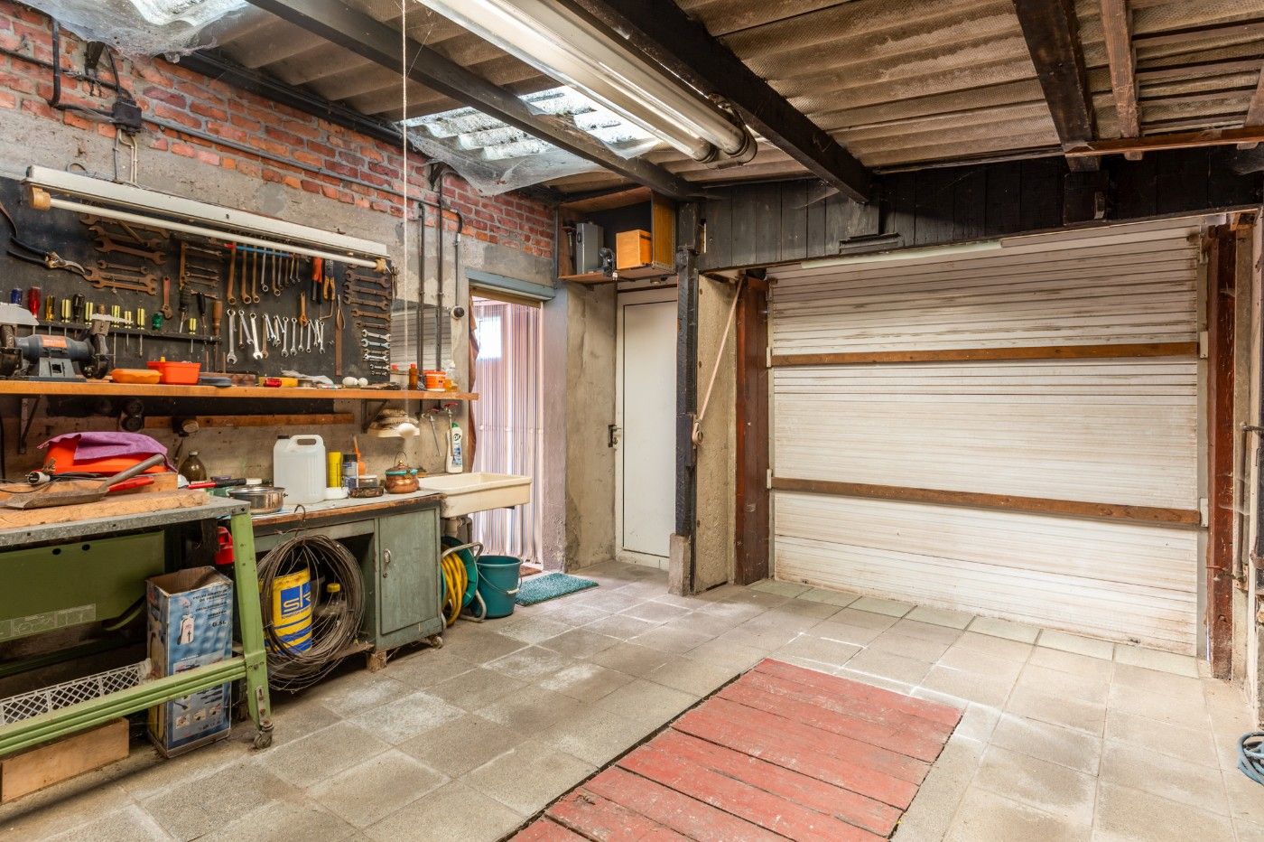 Tof gelegen, te renoveren woning met 2 slpk., garage en tuin foto 12