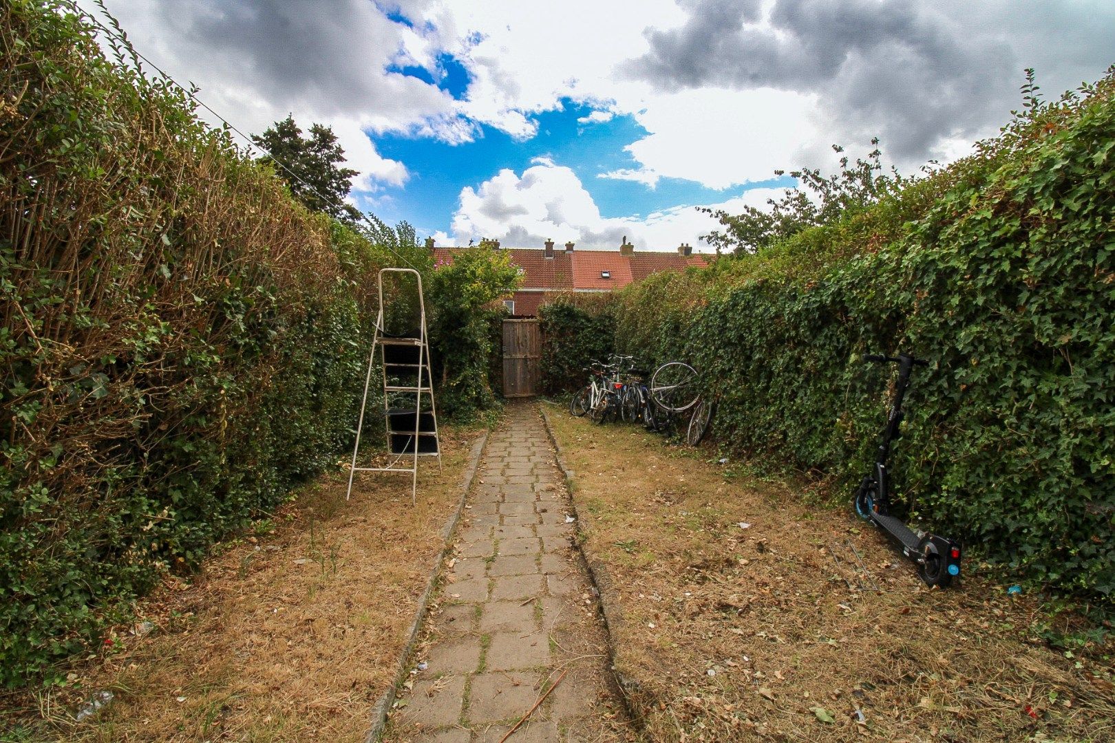 Te koop: Charmante rijwoning met diepe tuin in hartje Sint-Niklaas! foto 12