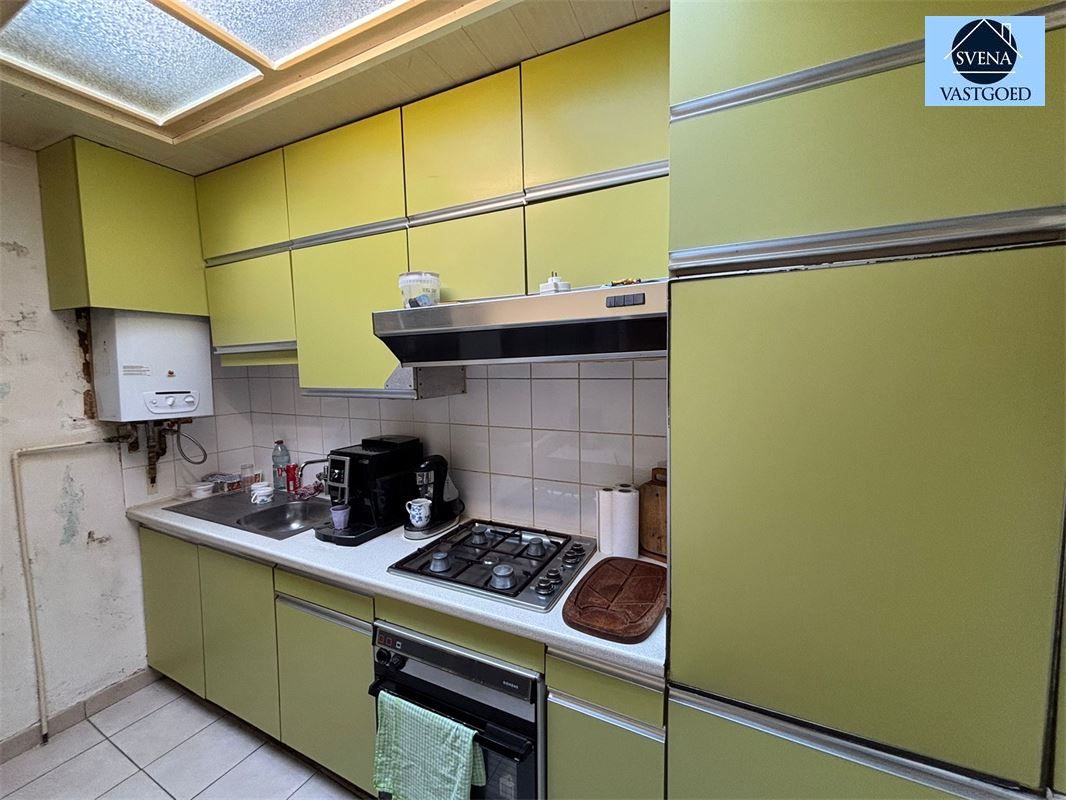 TE RENOVEREN WONING NABIJ CENTRUM MET 4 KAMERS. foto 5