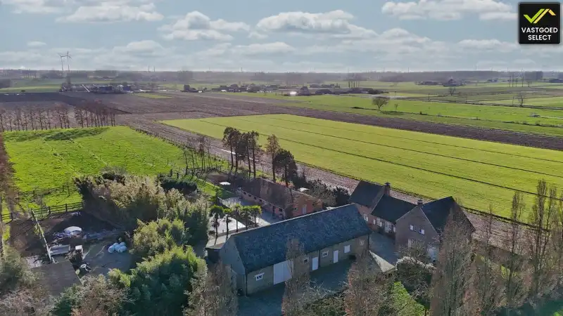 Authentieke hoeve op 13.920 m² met verzicht over de velden foto {{pictureIndex}}