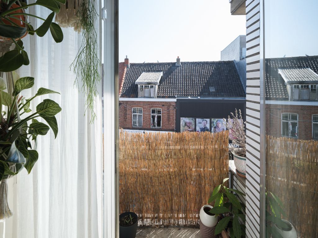 Lichtrijk en ruim 2 slpk appartement op fietsafstand van Gent centrum en wandelafstand van het natuurpark Bourgoyen-Ossemeersen. Een echte opportuniteit door zijn ligging, prijs en potentieel! foto 5