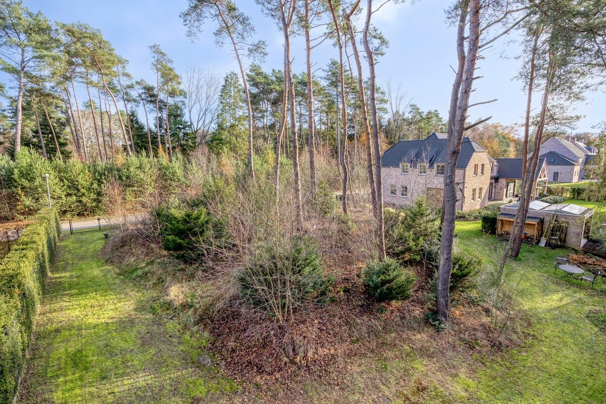 Ruim ingedeelde en kwalitatief afgewerkte villa op een mooi perceel met naastgelegen bouwgrond. foto 38