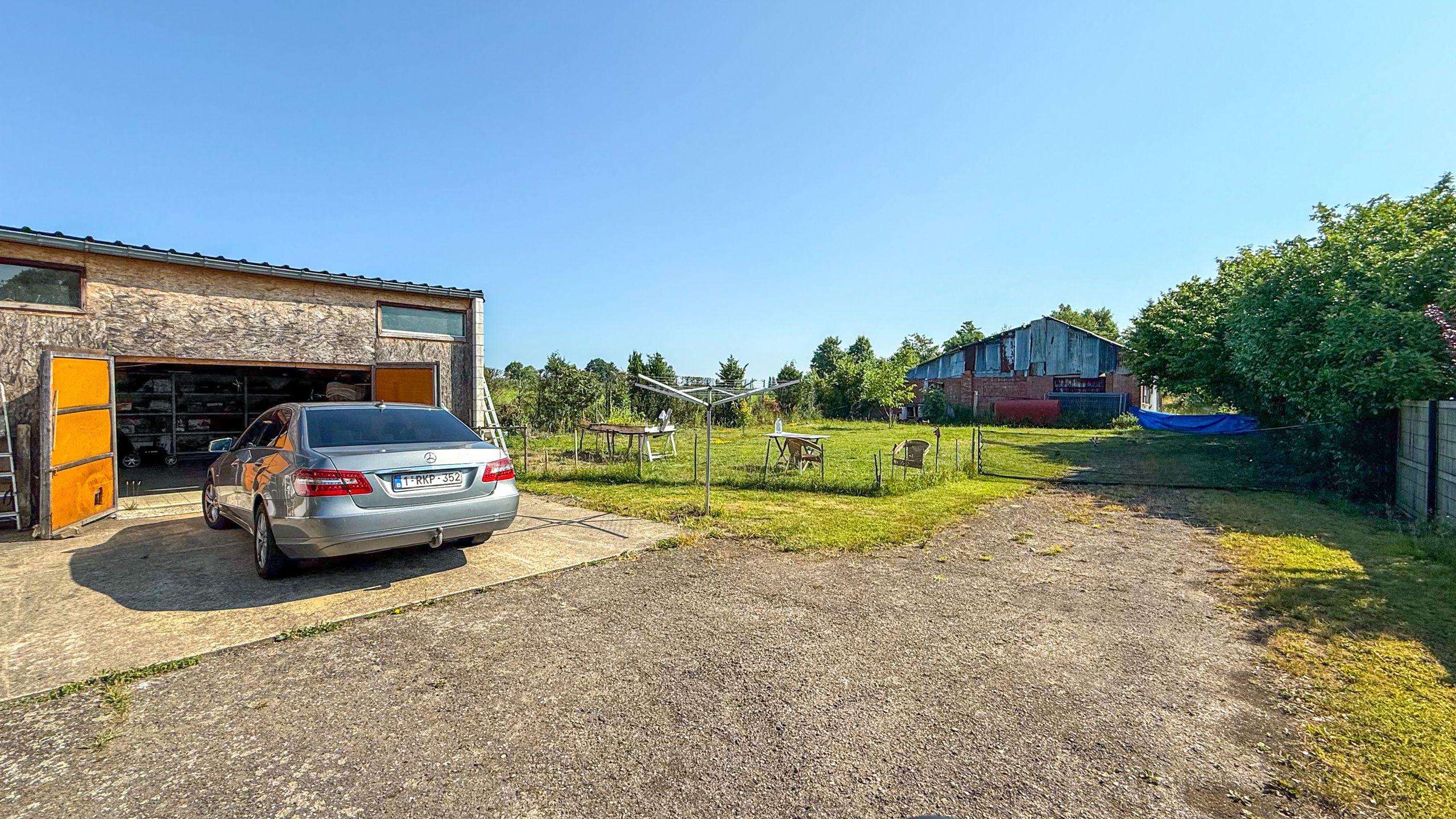 Vrijstaande woning met hangar en groot stuk grond-13.000m²! foto 30
