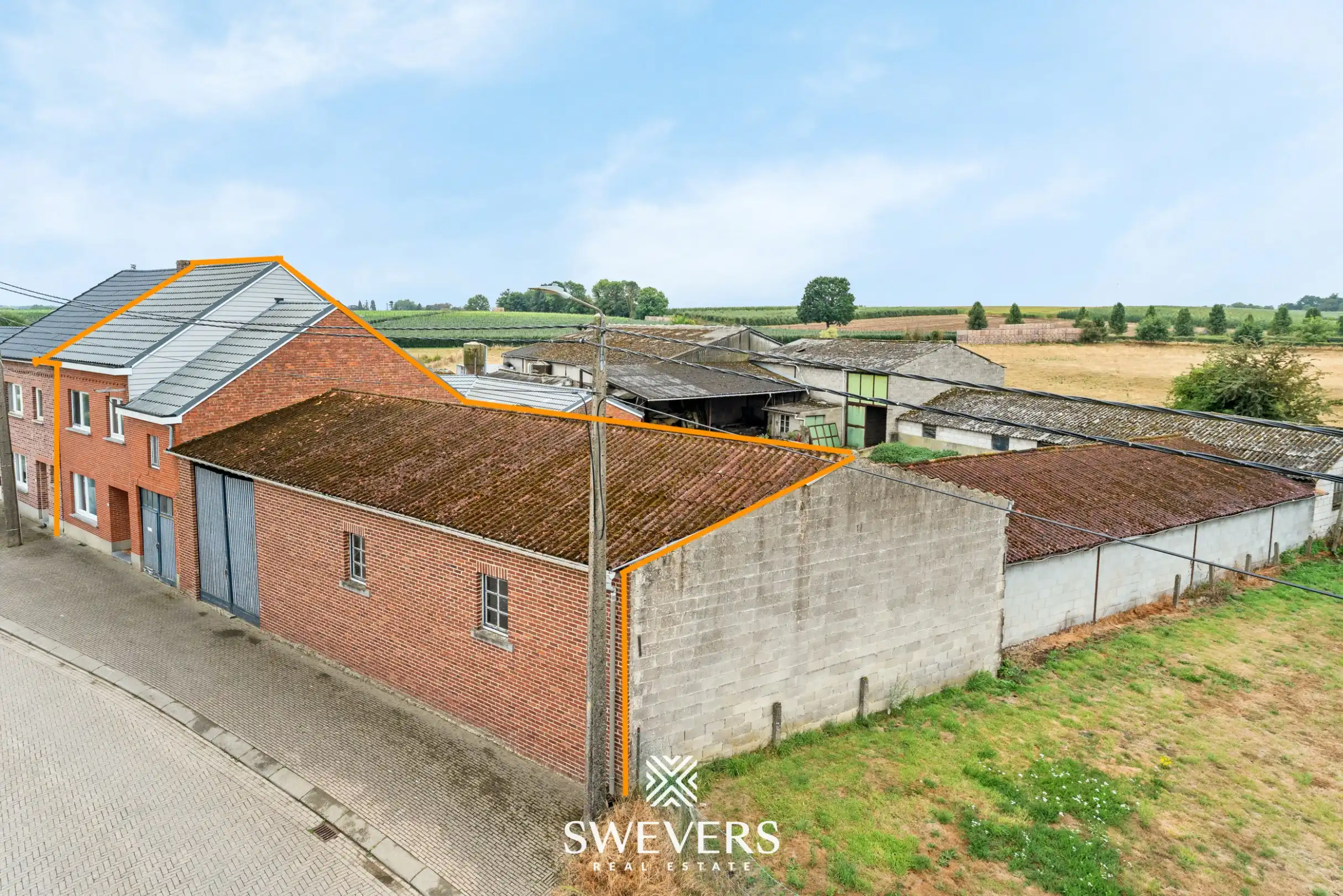 Karaktervolle hoeve met tal van mogelijkheden op rustige ligging in Borgloon foto 2