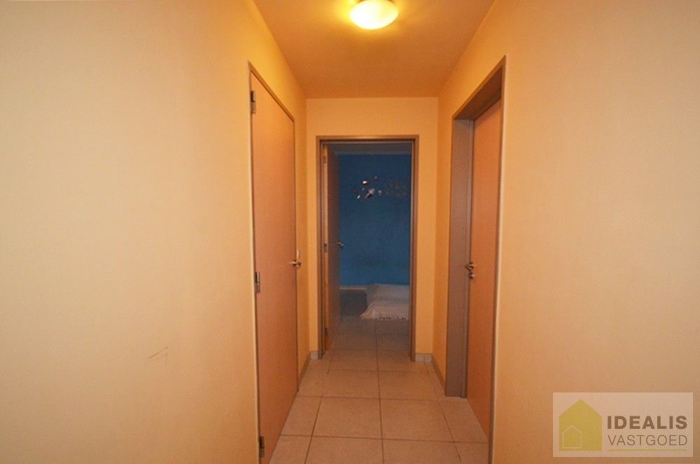 Ruim en aangenaam appartement pal in het centrum van Neerpelt! foto 10