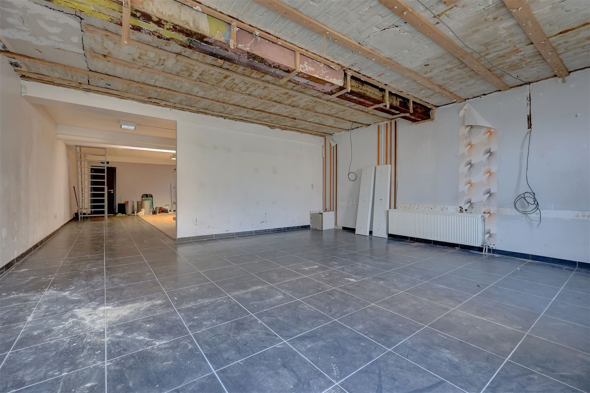 Handelsgelijkvloers op uitstekende ligging in Wilrijk te huur foto 13