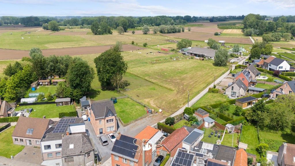 Bouwgrond met gezinstuin en aanpalend grasland op 7.598m² foto 4