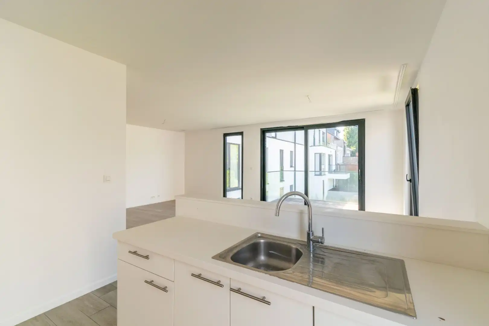 Een ruim (116m²), recent nieuwbouwappartement te Dilbeek! foto 12