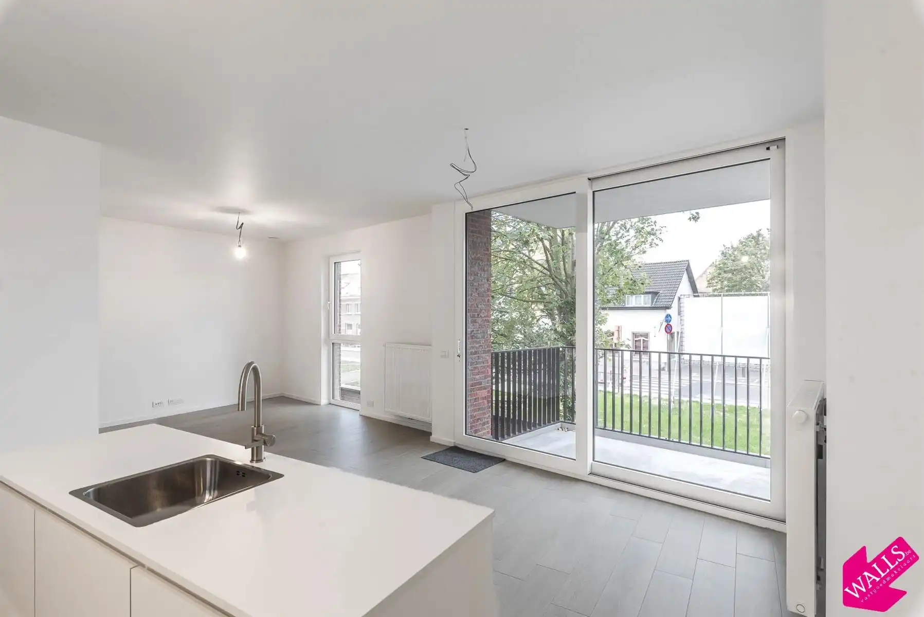 Energiezuinig appartement met 2 slk, terras en P nabij Boekenbergpark foto 2