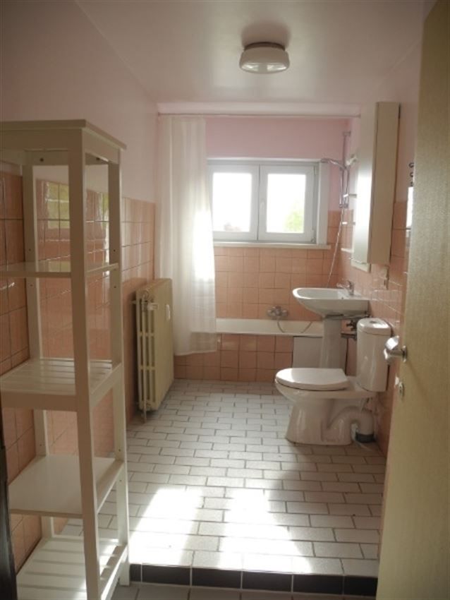 Opbrengsteigendom (handel & 4 app) op toplocatie foto 45