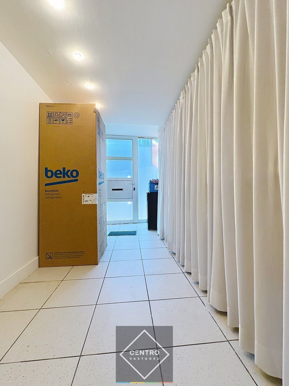 Gelijkvloerse kantoor/praktijkruimte én triplex appartement (met aparte toegangen) op het Kerkplein van Rumbeke! foto 25