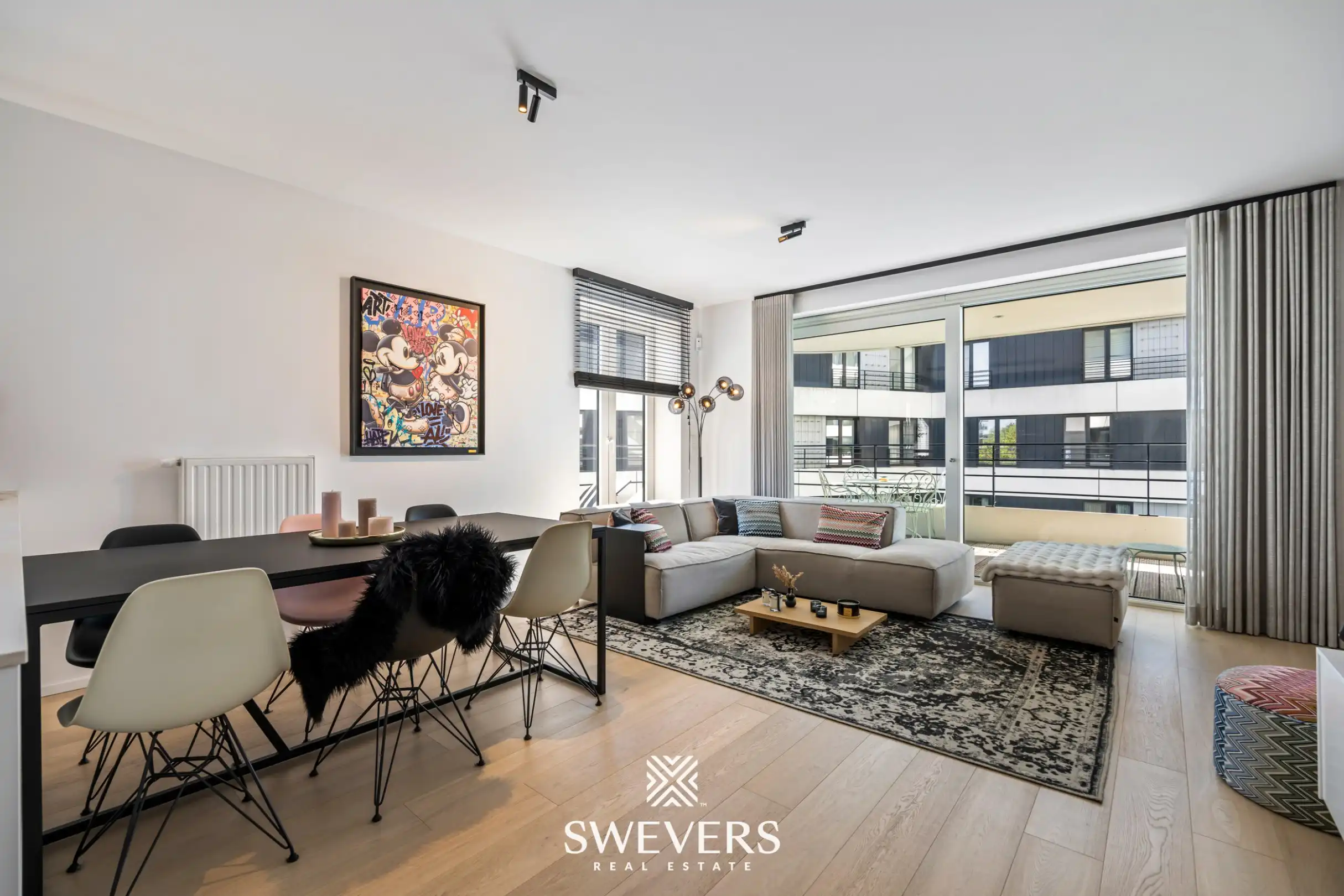Luxueus appartement met zicht op het kanaal en ruim terras op zuidzicht in Hasselt foto {{pictureIndex}}