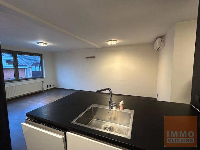 Appartement met twee slaapkamers en gemeenschappelijke tuin. foto 11