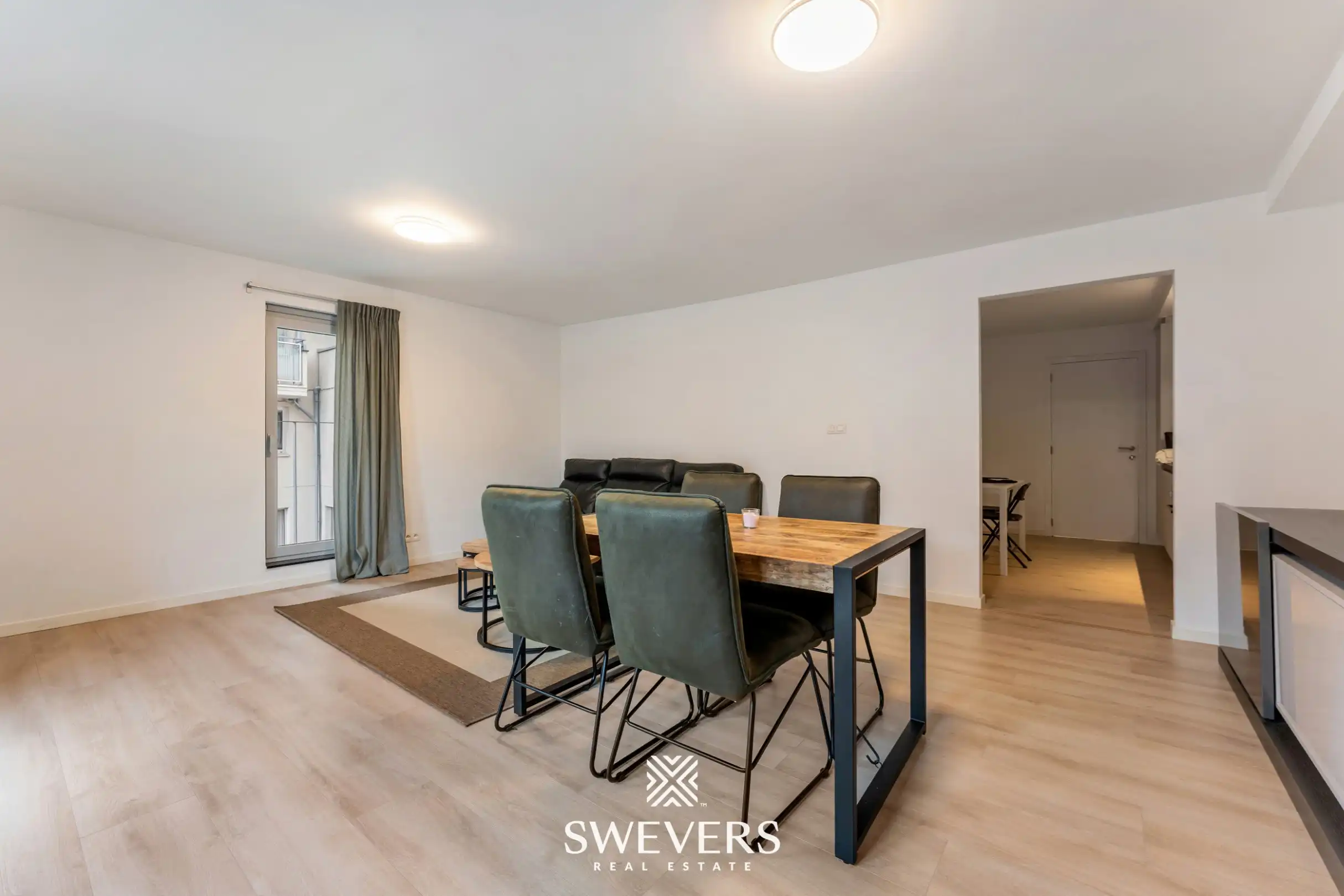 Modern en instapklaar appartement in hartje Genk met uitstekende investeringsopportuniteit foto 5