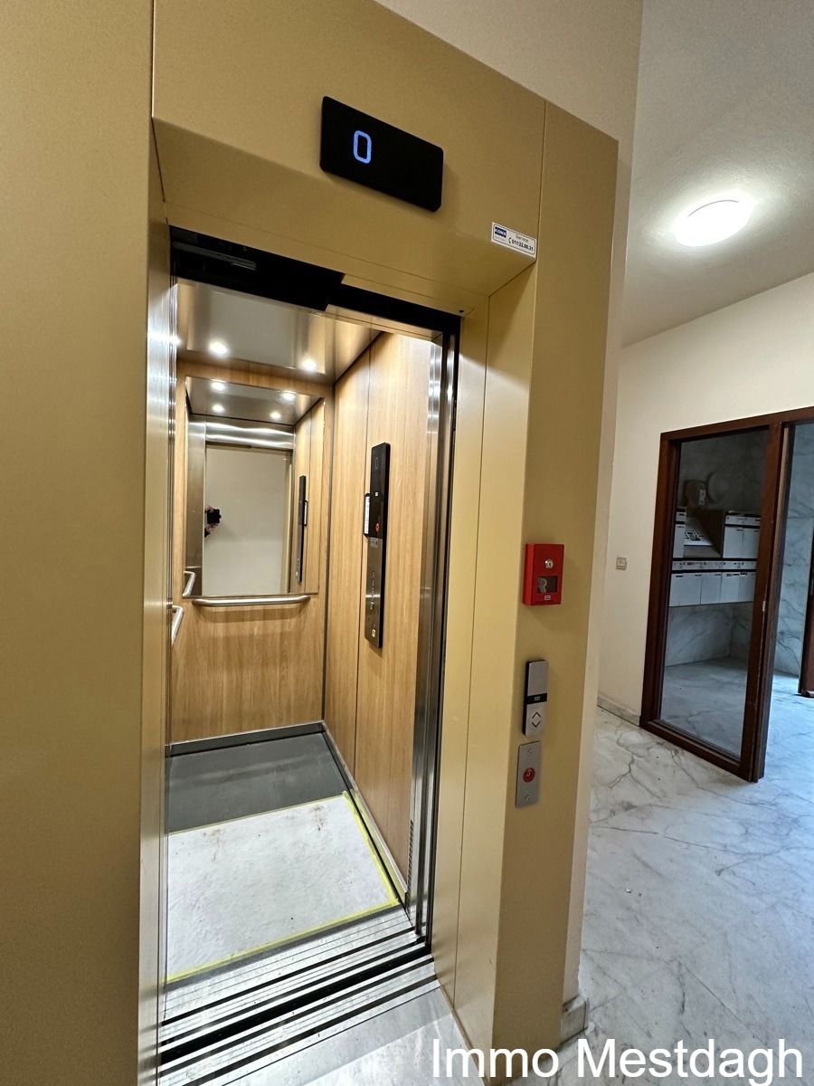 Royaal appartement met garagebox en zicht op de Schaffense Poort. foto 26