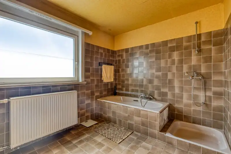 Ruime open bebouwing met potentieel in groene, rustige buurt van Evergem foto 7