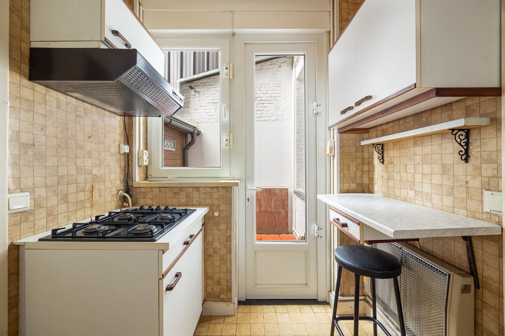 Gelijkvloers appartement met koer in hartje Stad foto 7