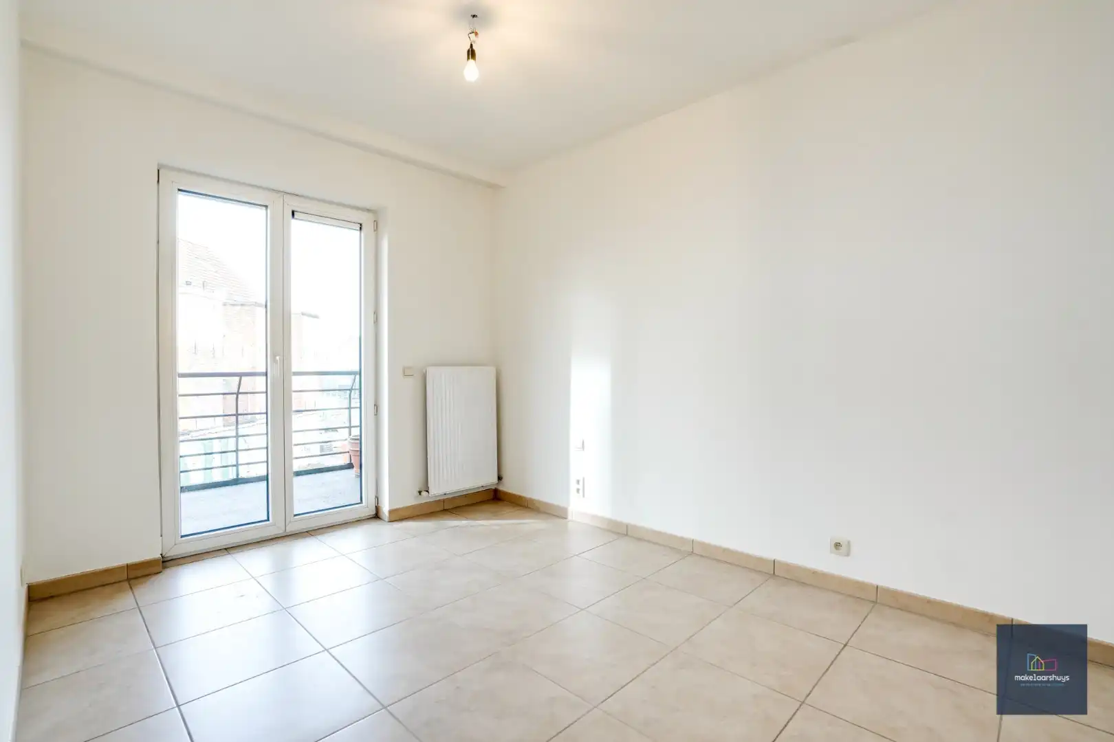 Goedgelegen 2slpk-appartement met terras en staanplaats foto 12