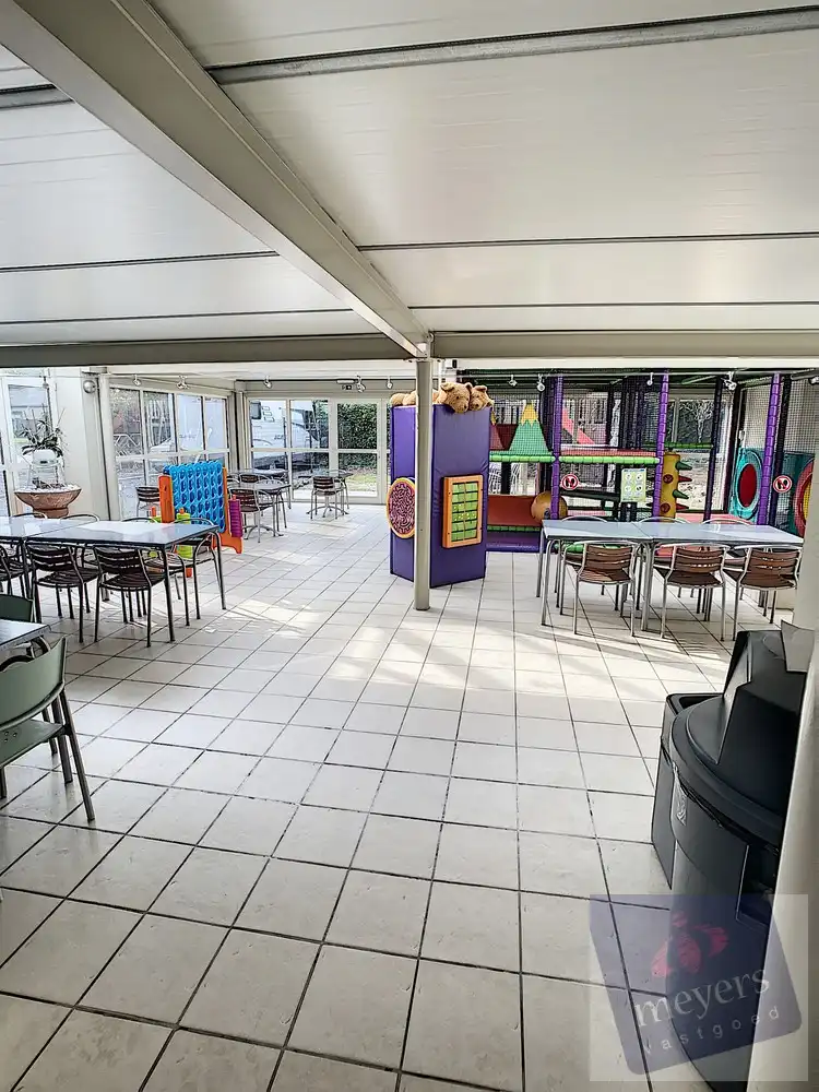 Handelsruimte met woonst op topligging in Koersel foto 8