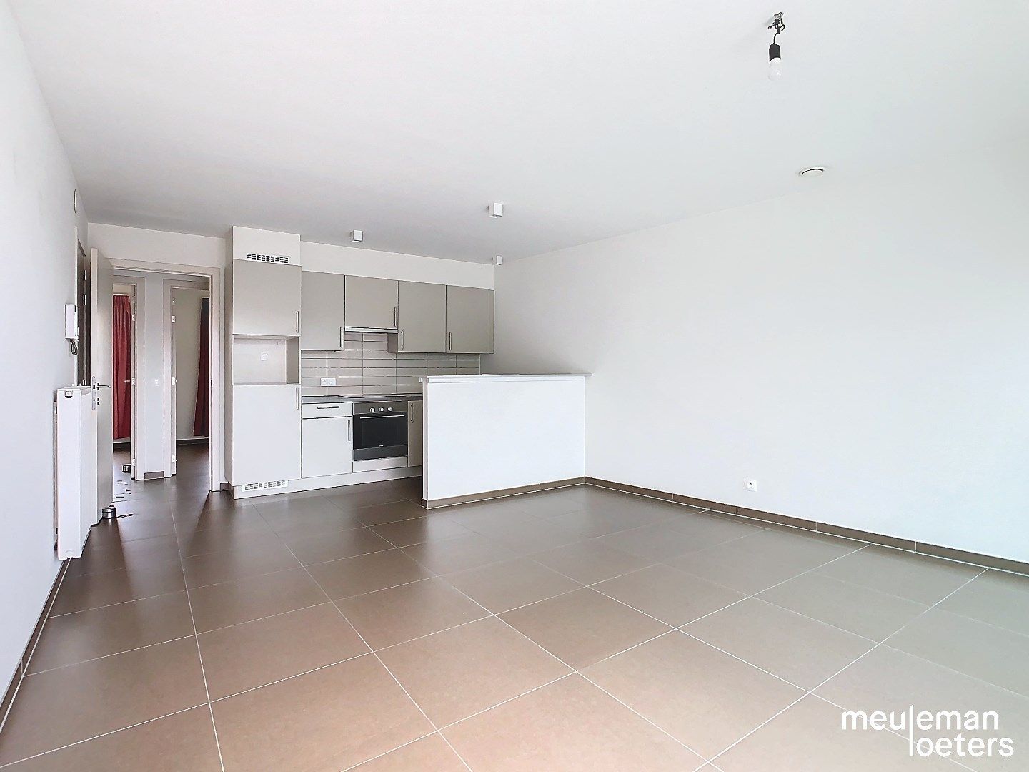 Centraal gelegen appartement met parking foto 4