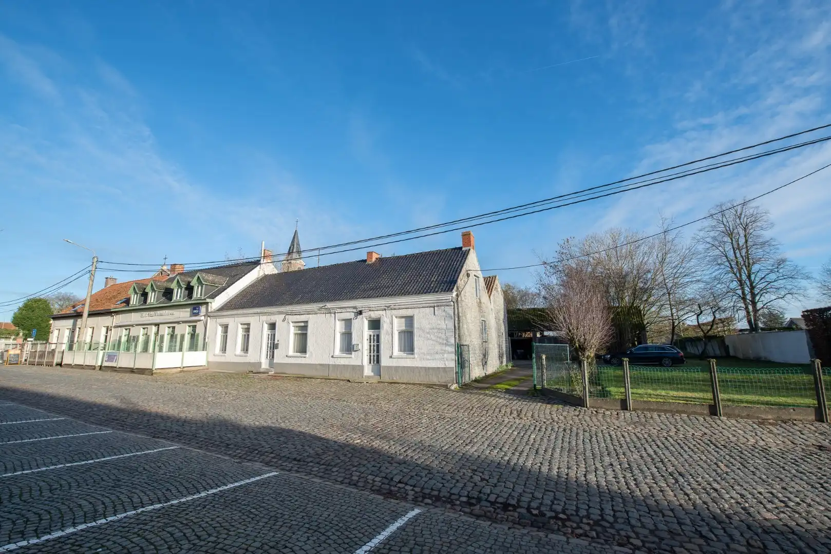 Ruim handelspand met 2 woningen te koop centrum Lozer. Tal van mogelijkheden! foto 2