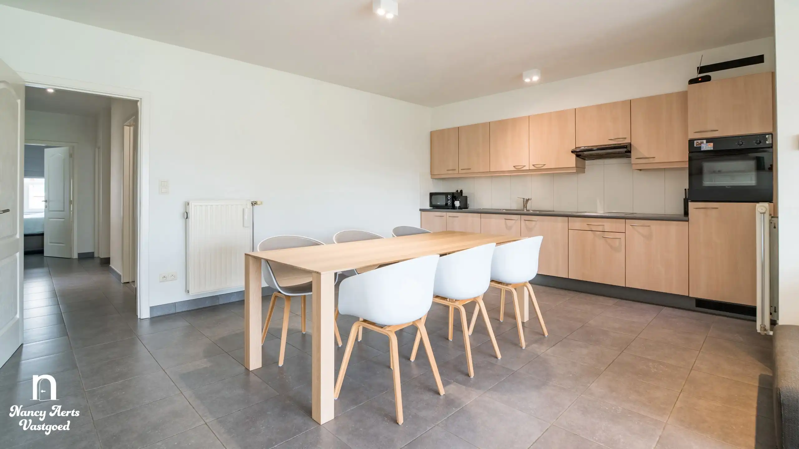 Lichtrijk gelijkvloers appartement met tuin en mooi uitzicht foto 5