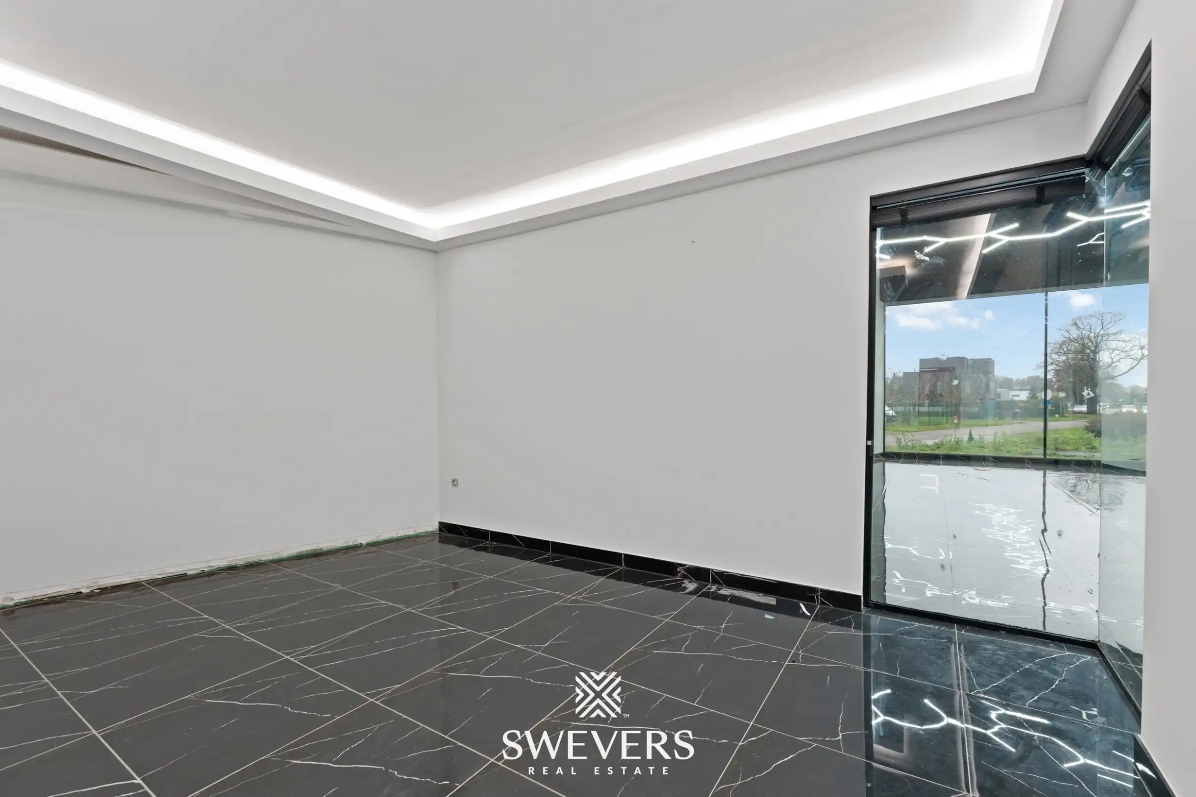 Showroom met commerciële mogelijkheden en toplocatie in Houthalen foto 9