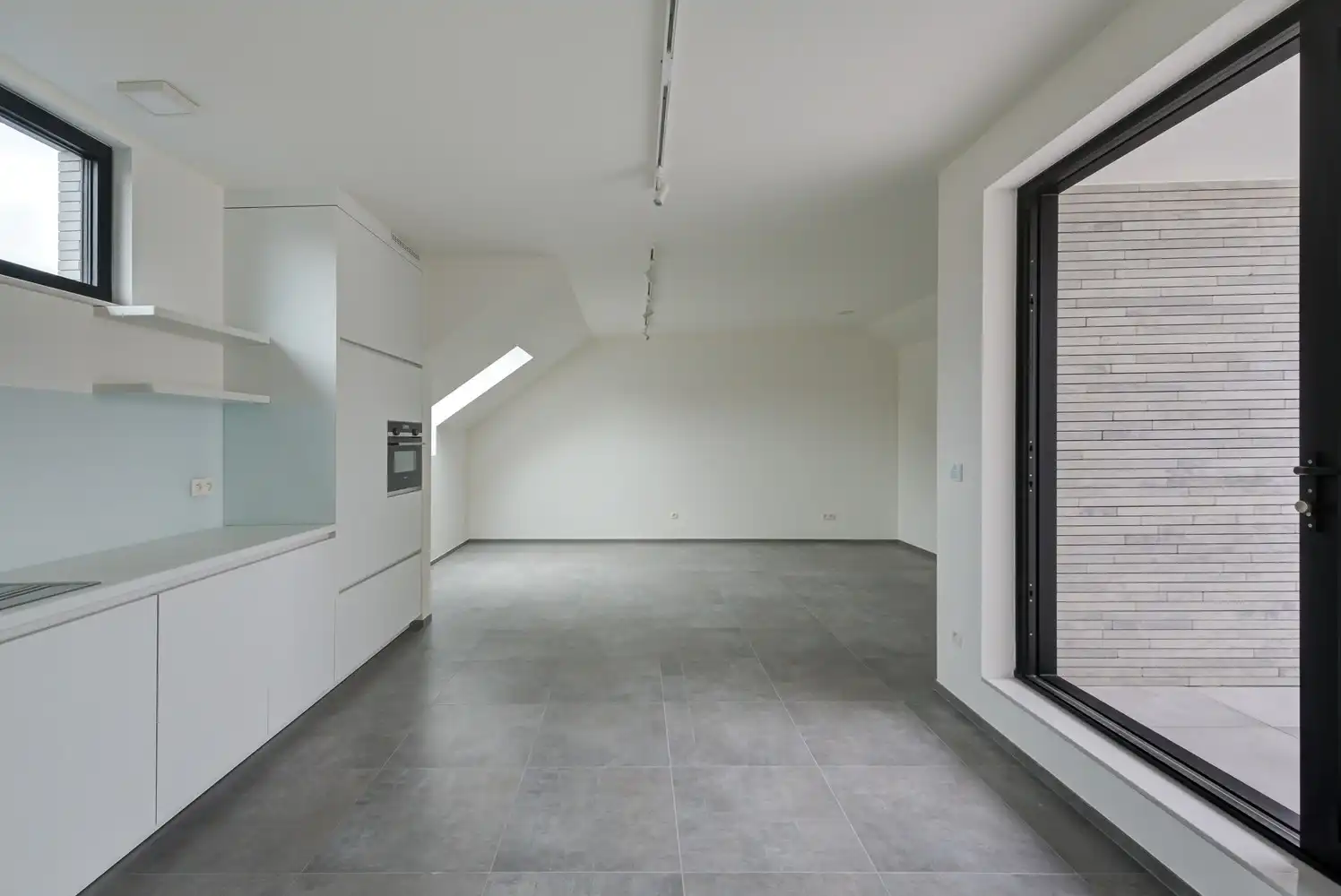 RECENT APPARTEMENT (116M²) MET TERRAS GELEGEN IN HET CENTRUM VAN BILZEN foto 3