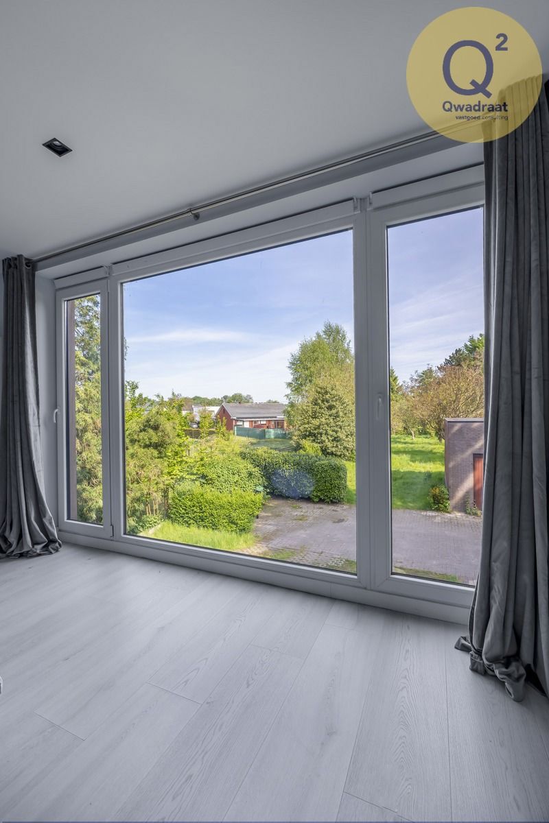 Ruime vernieuwde woning met 4 slpks en grote tuin foto 19