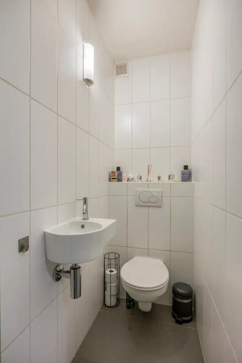 Gelijkvloers appartement met 2 kamers, tuin en garage foto 16