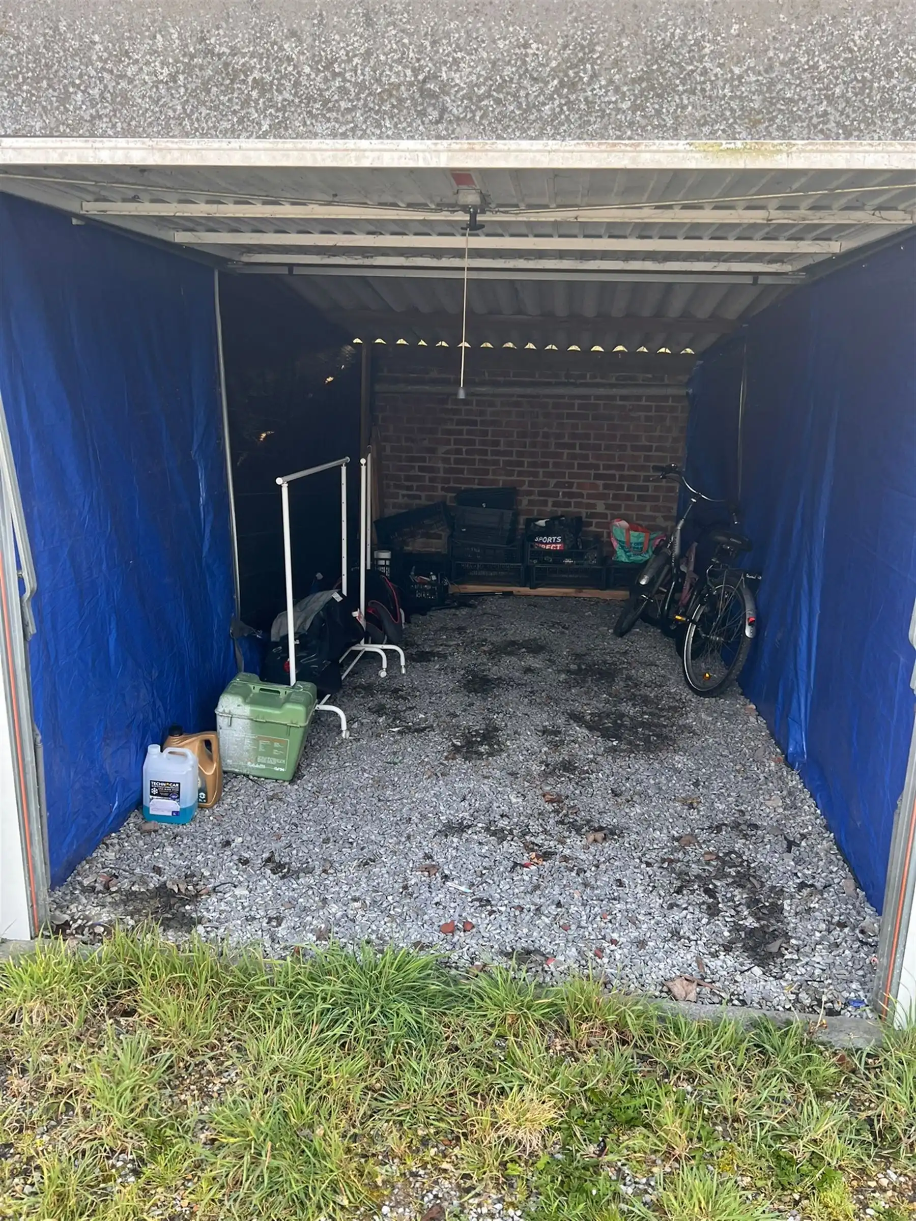 Ideale investering bouwgrond met 20 achterliggende garageboxen foto 6