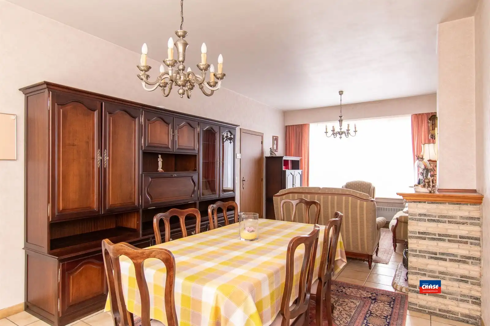 Halfopen bebouwing met 3 slaapkamers, tuin + 3 garageboxen foto 3