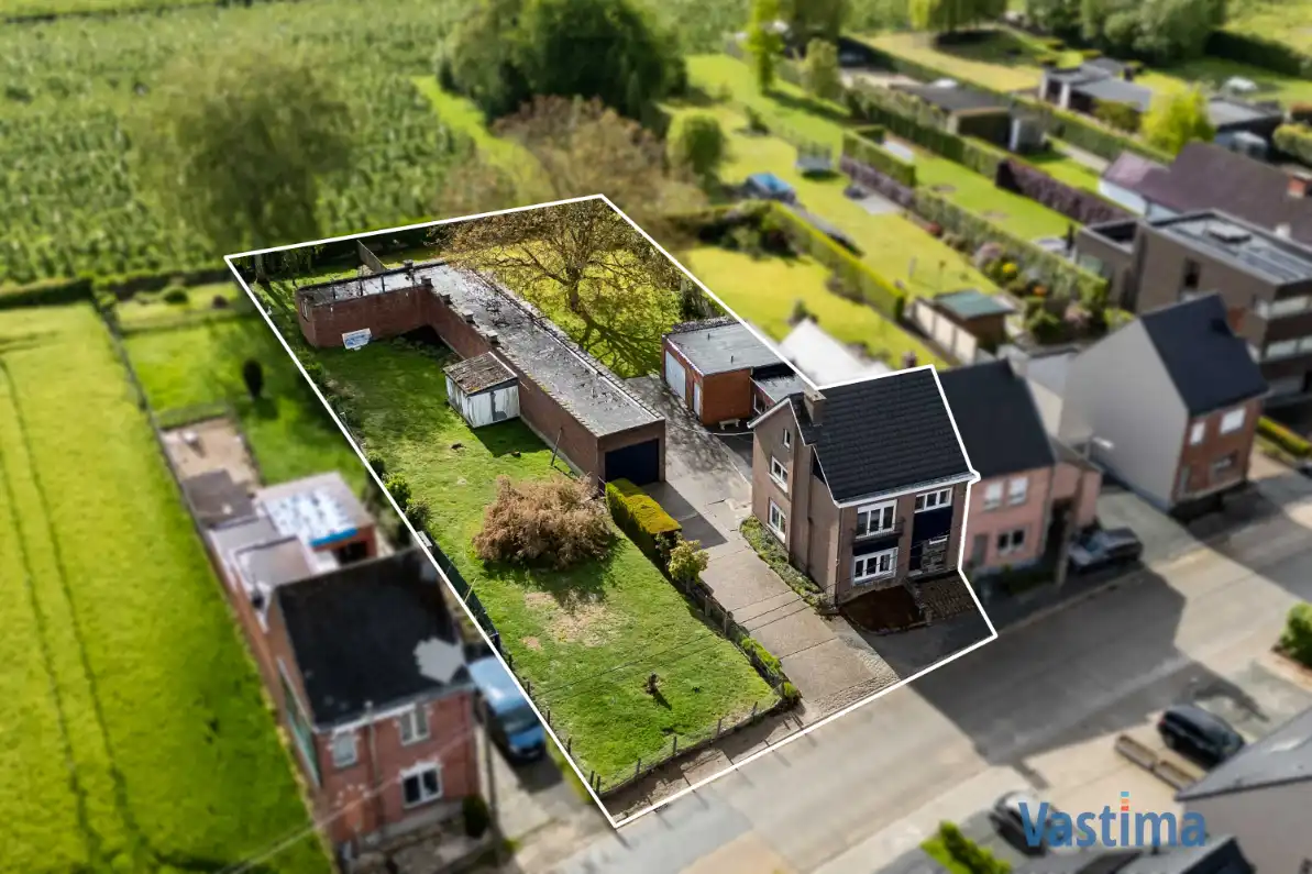 Woning met opslagruimte en grond op strategische ligging foto 2
