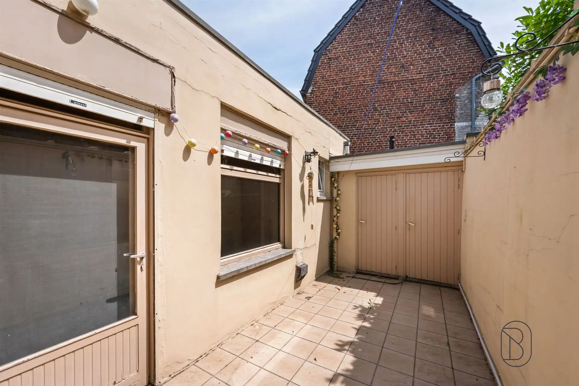 Te renoveren woning met 3 SLK, stadstuin en veel potentieel foto 8