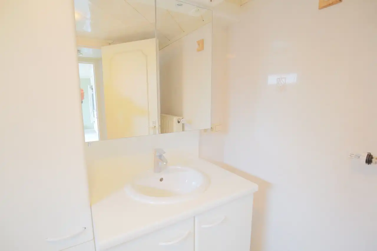 Rijwoning met terras en tuin foto 7