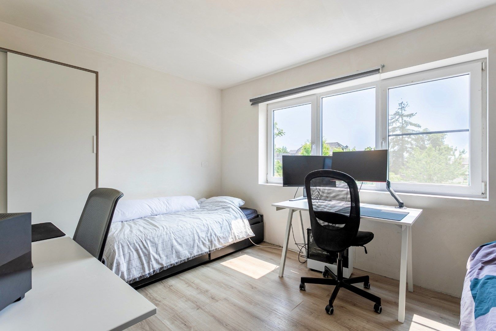 Instapklare woning met 3 slaapkamers, tuin en carport foto 15