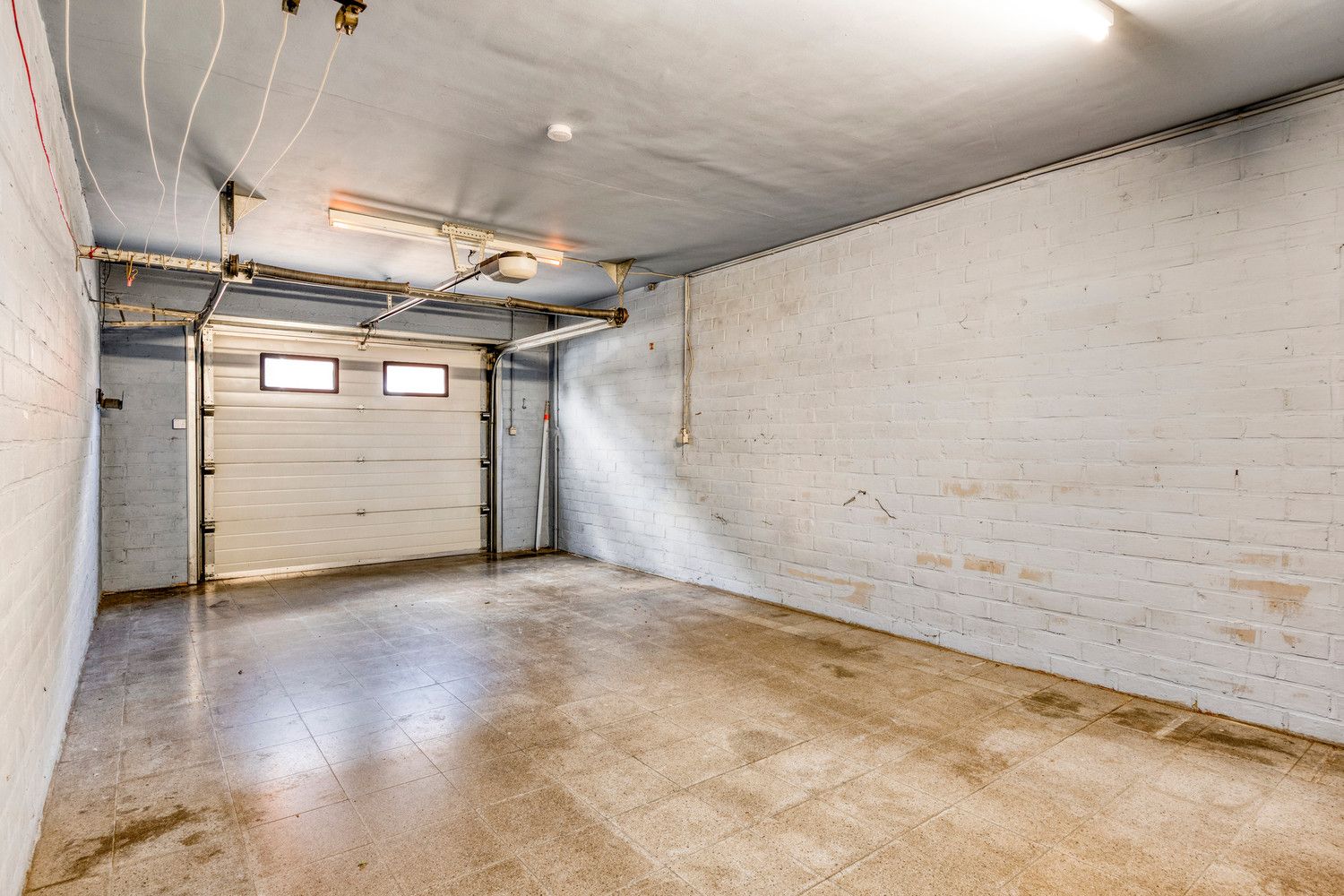 GELIJKVLOERS APPARTEMENT MET 3 SLAAPKAMERS EN INPANDIGE GARAGE TE HALEN! foto 21